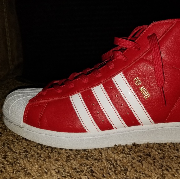 red and white shell toe adidas